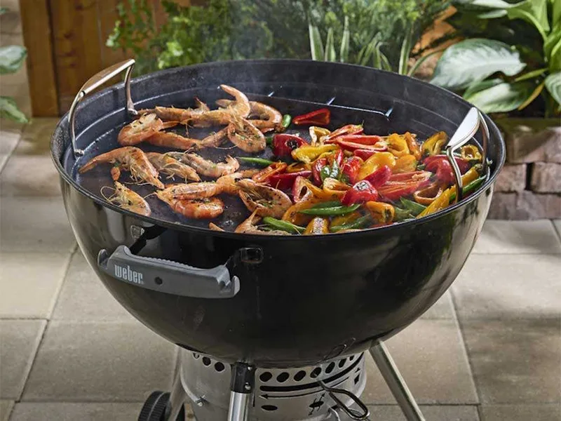 Plaque ronde en fonte pour barbecue Weber au charbon de bois