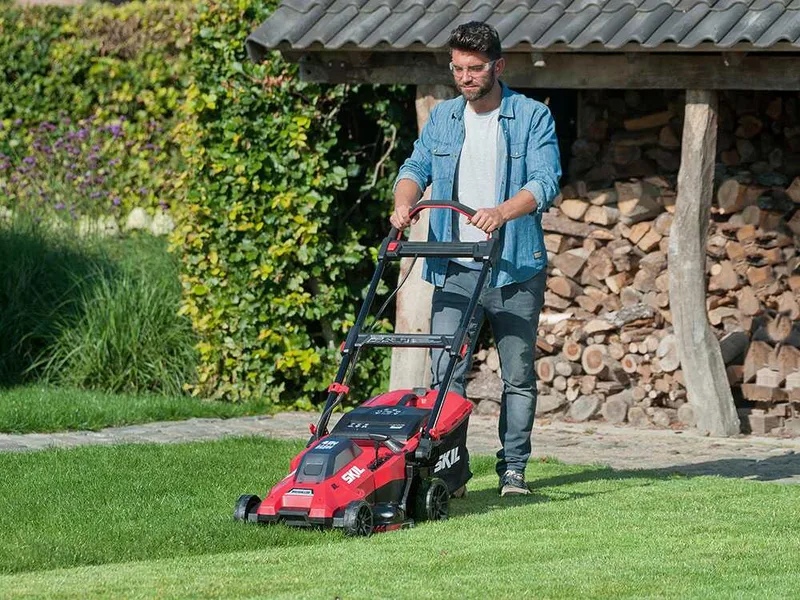 Skil 0140 BA - Tondeuse à gazon à batterie - 2x20V/4ah - Coupe 43 cm - Coupe-bordures en cadeau