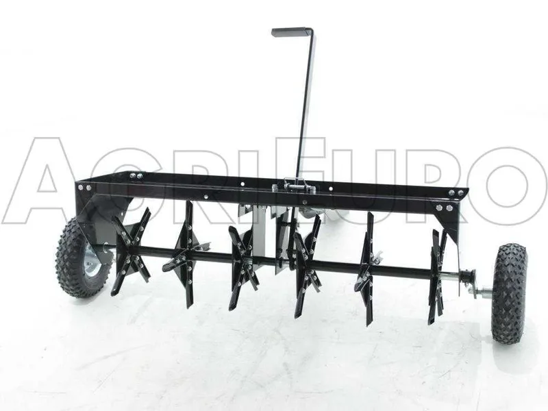 Aérateur scarificateur tracté à disques pour tracteur tondeuse - avec dispositif d'attelage