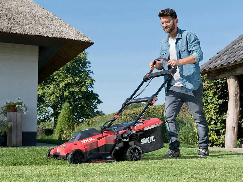 Skil 0140 BA - Tondeuse à gazon à batterie - 2x20V/4ah - Coupe 43 cm - Coupe-bordures en cadeau