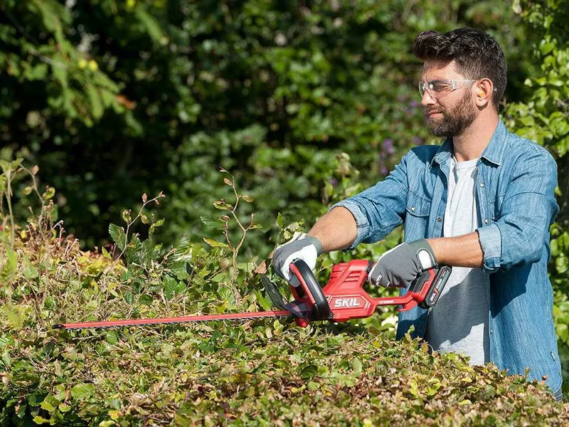 Skil 0430 CA - Taille-haie à batterie - Lame de 55 cm - 20v/2.5ah