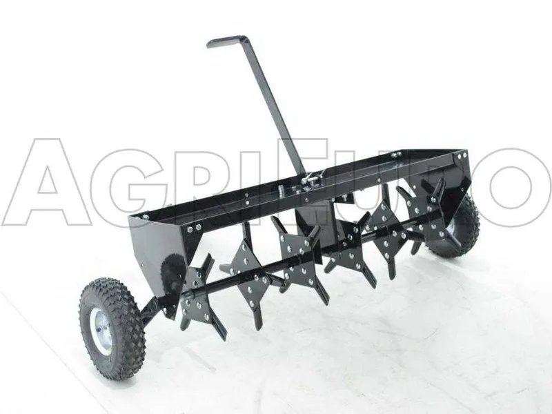 Aérateur scarificateur tracté à disques pour tracteur tondeuse - avec dispositif d'attelage