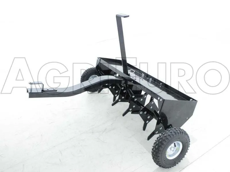Aérateur scarificateur tracté à disques pour tracteur tondeuse - avec dispositif d'attelage