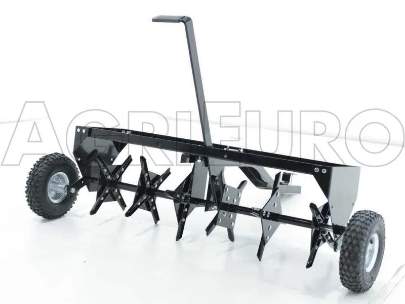 Aérateur scarificateur tracté à disques pour tracteur tondeuse - avec dispositif d'attelage