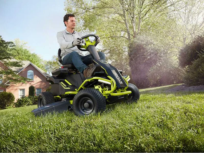 Tracteur tondeuse à batterie Ryobi RM480E - Coupe mulching - Éjection latérale - 4 x 12V au plomb liquide