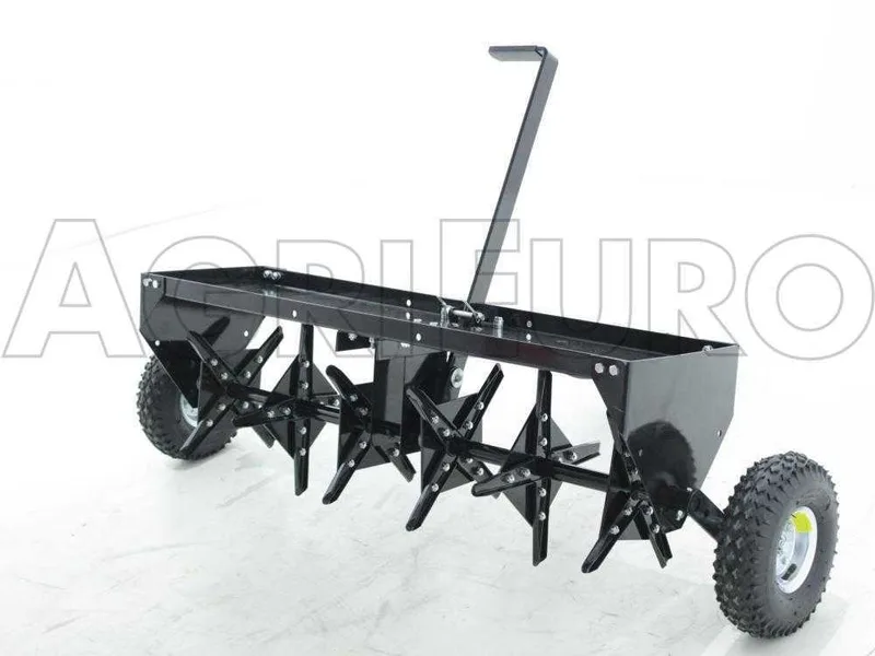 Aérateur scarificateur tracté à disques pour tracteur tondeuse - avec dispositif d'attelage